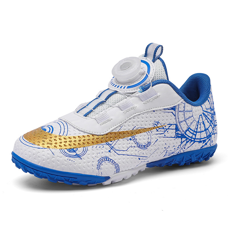 2023 hebilla giratoria transpirable para niños zapatos de fútbol de uñas rotas zapatos de entrenamiento de hierba de interior Pato Mandarín zapatillas de fútbol resistentes al desgaste