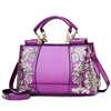 Capacious one-shoulder bag, with embroidery