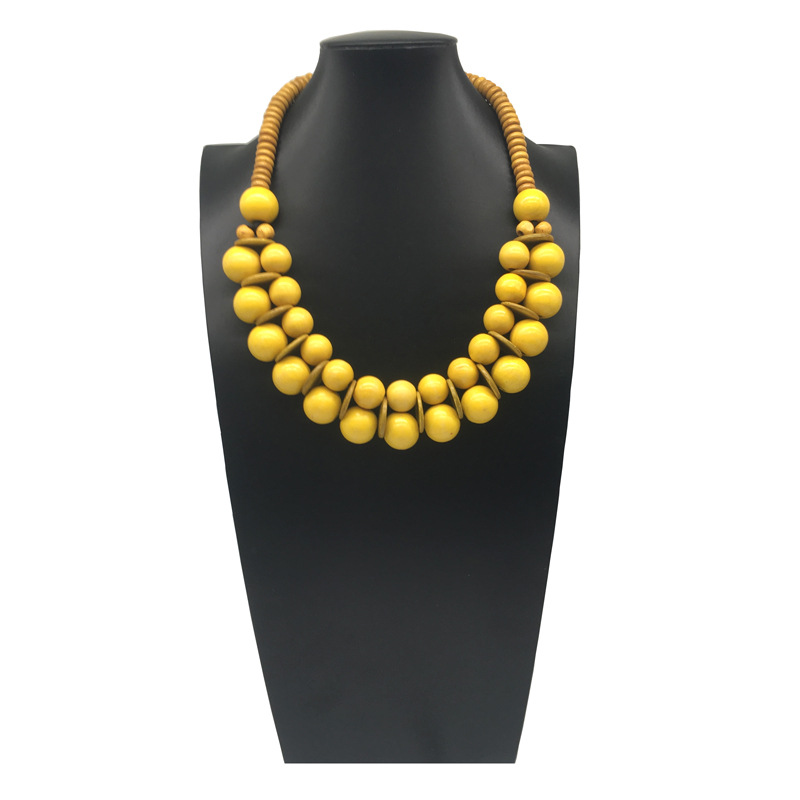 Collana etnica boho con perline in legno e guscio di cocco_voghion.com