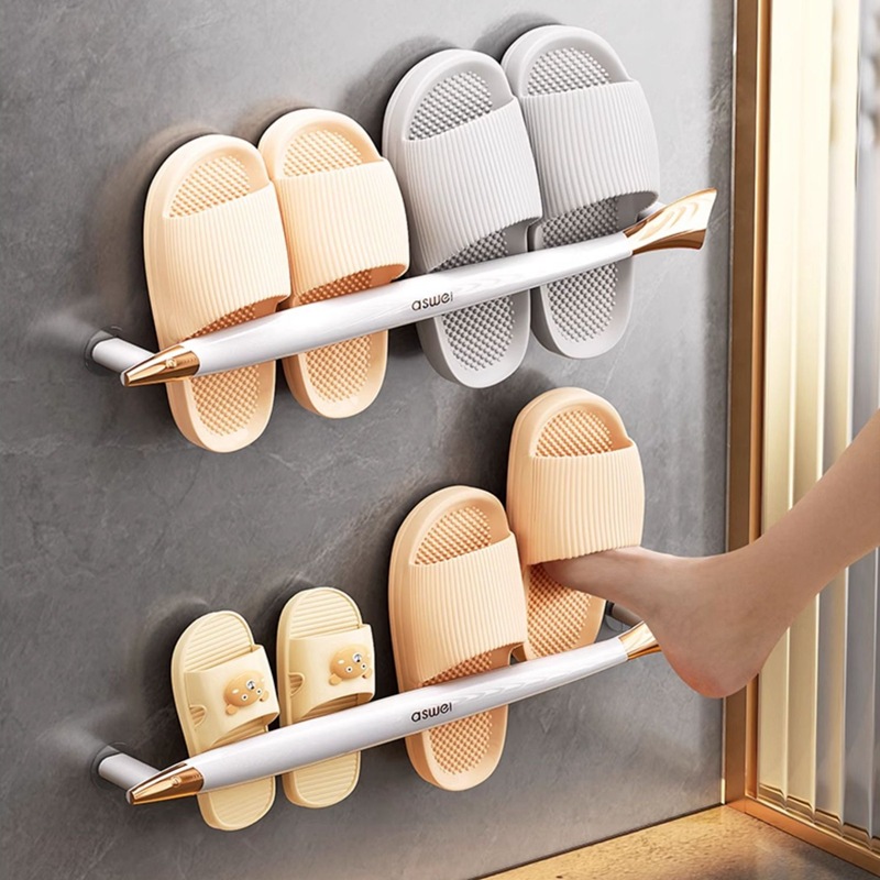 Rack de zapatillas de baño sin agujeros colgados en la pared Rack de almacenamiento de artículos de baño doméstico Rack de almacenamiento de artefactos de inodoro Rack de drenaje de zapatillas de baño