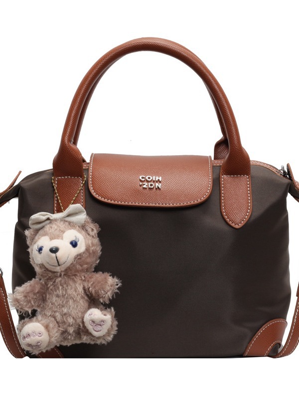 Nylon color contrastante empalme bolso de bolsillo portátil mujer 2024 nuevo estilo transfronterizo de alta calidad exquisita mochila de hombro