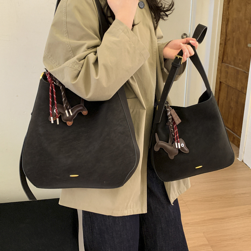 BENL alta sensación de bolso de invierno para mujeres 2025, nuevo tipo de gran capacidad, bolso de cubo de transporte, bolso de hombro de viaje