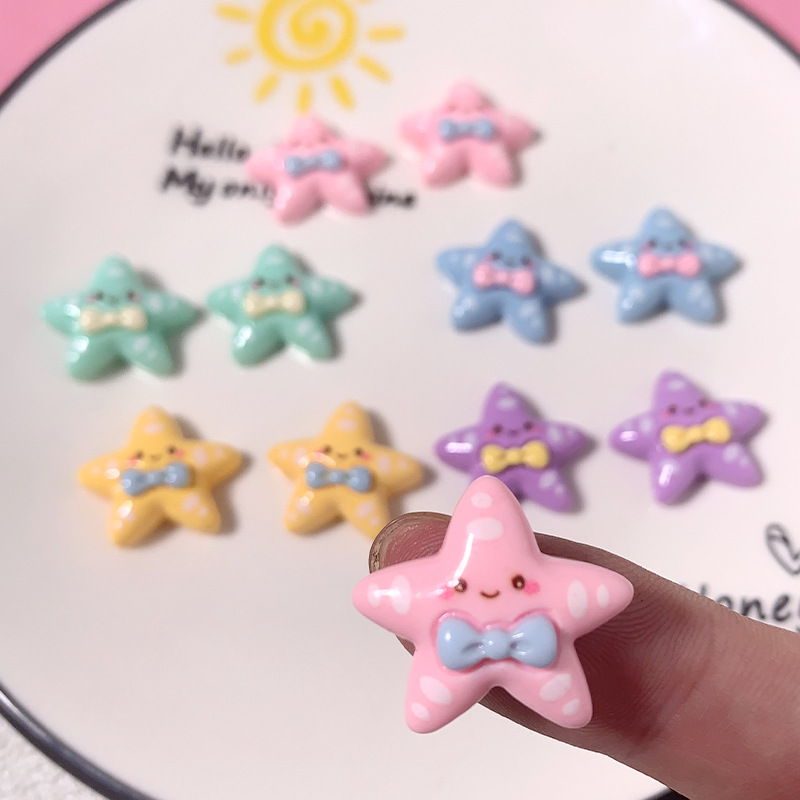 Cartoon brillante corbata estrella de mar material DIY accesorios de resina pegamento crema caja de teléfono móvil material clip de pelo parche de taza de agua