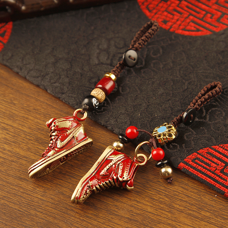 Cross-border best-selling brass sneaker pendant, creative boot model keychain, handmade braided rope car key accessory