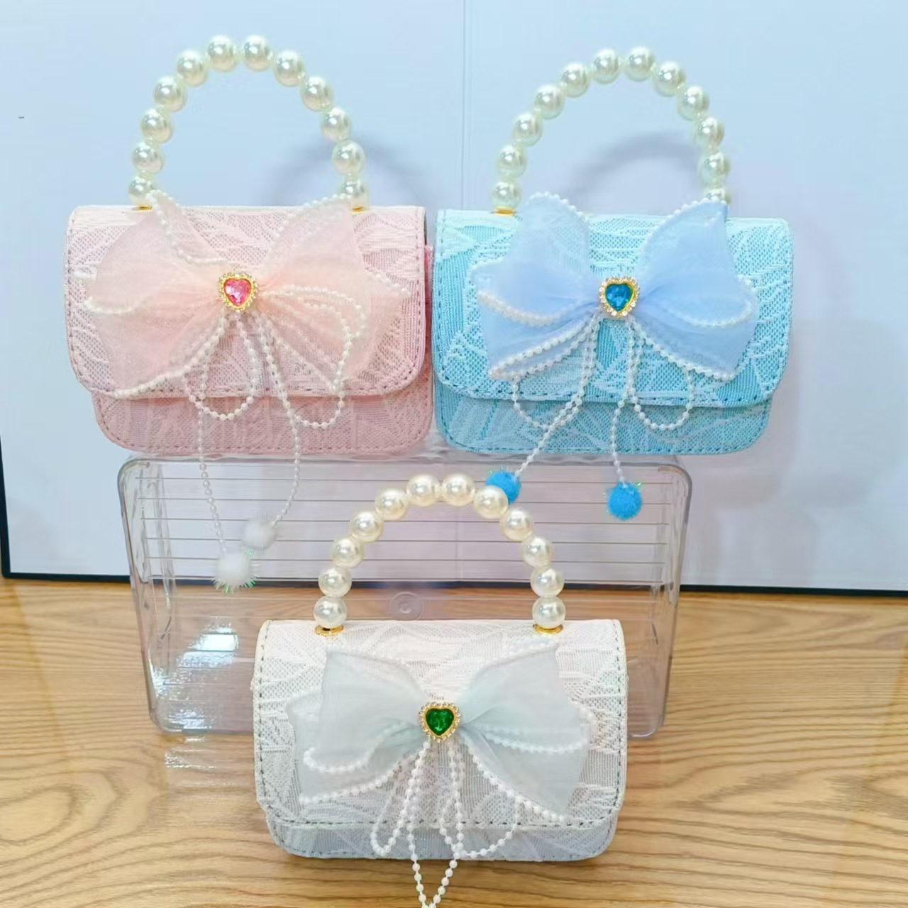 Bolso de princesa con lazo Bolso de perla Bolso de mensajero de cadena Bolso de hombro para niñas Bolso de niño con fragancia pequeña Bolso de accesorios