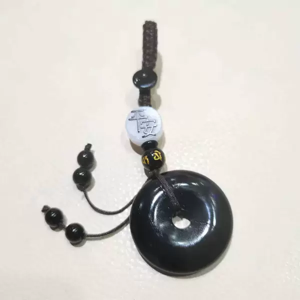 Protective amulet, buckle, keychain