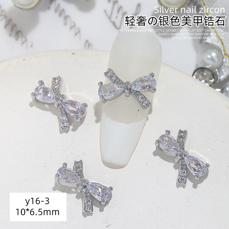 Joyería de circonio para decoración de uñas, lazo para decoración de uñas, aleación de diamantes, perla, joyería de diamantes, accesorios de decoración de libros rojos pequeños, venta al por mayor