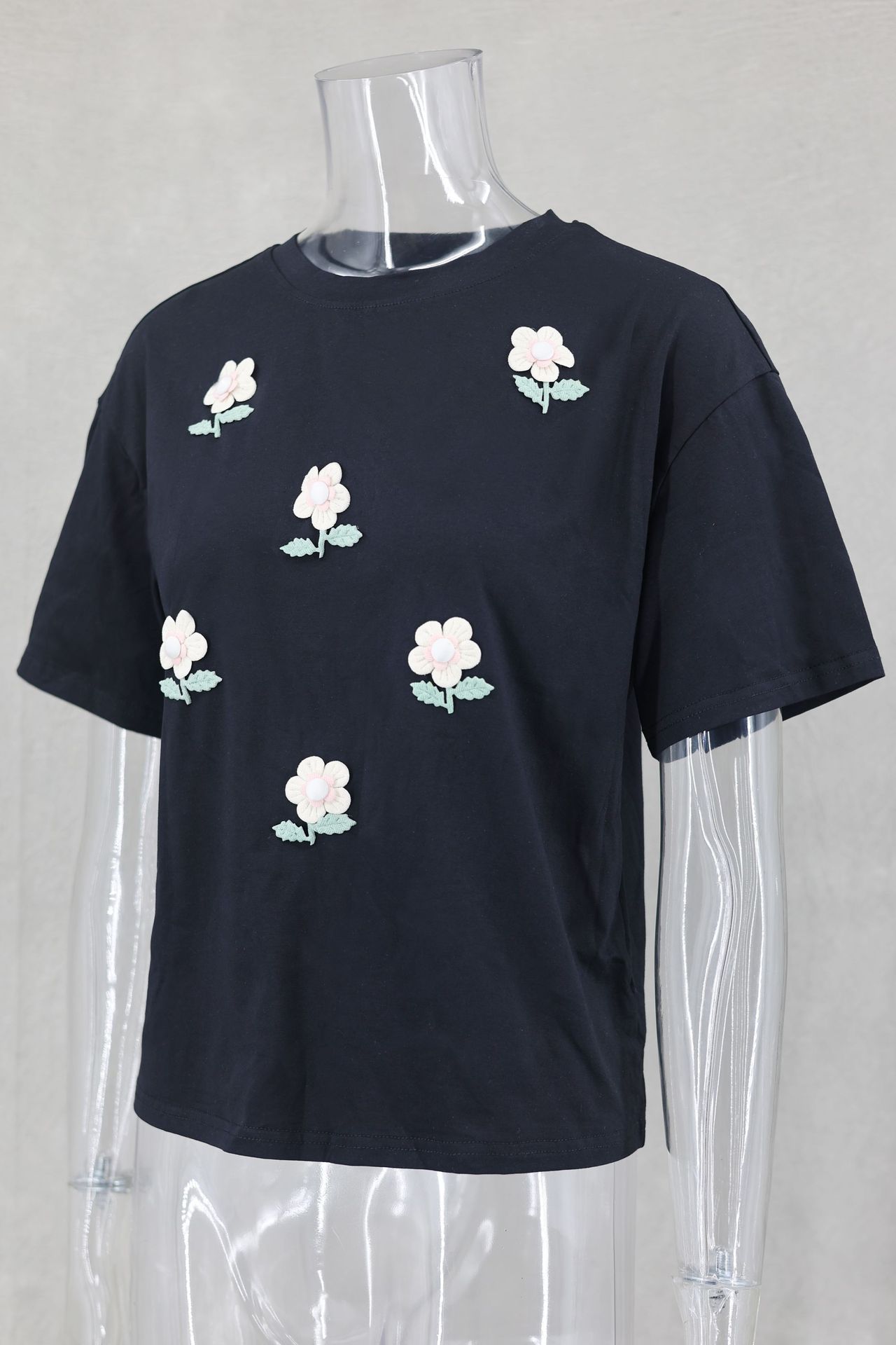 140g Weight Short Sleeve Sleeve Length Pullovers Placket Type Regular Sleeve Sleeve Type Polyester Fabric Type Regular Top Length T-shirt Tops Type Daily Occasion Round Neck Neckline Loose Fit Type Flower Pattern Summer Season Women's Gender Casual Style Wholesale Women's Casual Flower Short Sleeve T-Shirts 9