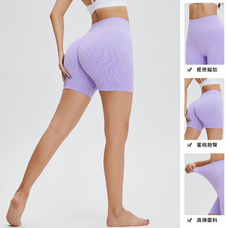 Nuevo estilo europeo y americano mar ondulación melocotón pantalones mujeres sin costuras estiramiento fitness deportes pantalones cortos transpirable cadera levantamiento yoga tres pantalones