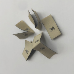 Apparel gold size code double G logo numeric size label ancient family number label G family hang tag code number woven label