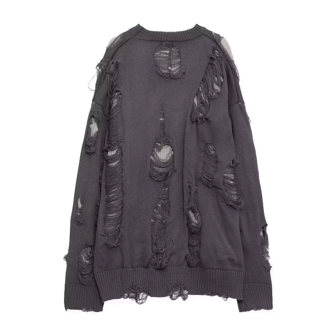 Поддельные две части осеннего и зимнего американского свитера на высокой улице