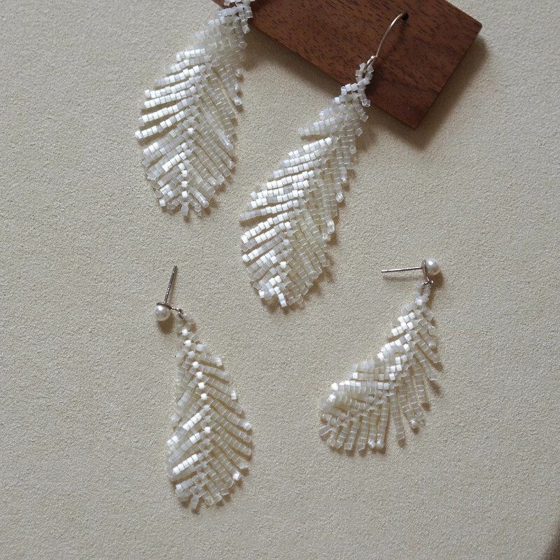 White Rice Bead Feather Earrings 2025 New High-End Beaded Beautiful Earrings Women's Literary Earrings White Rice Bead Feather Earrings 2025 New High-End Beaded Beautiful Earrings Women's Literary Earrings