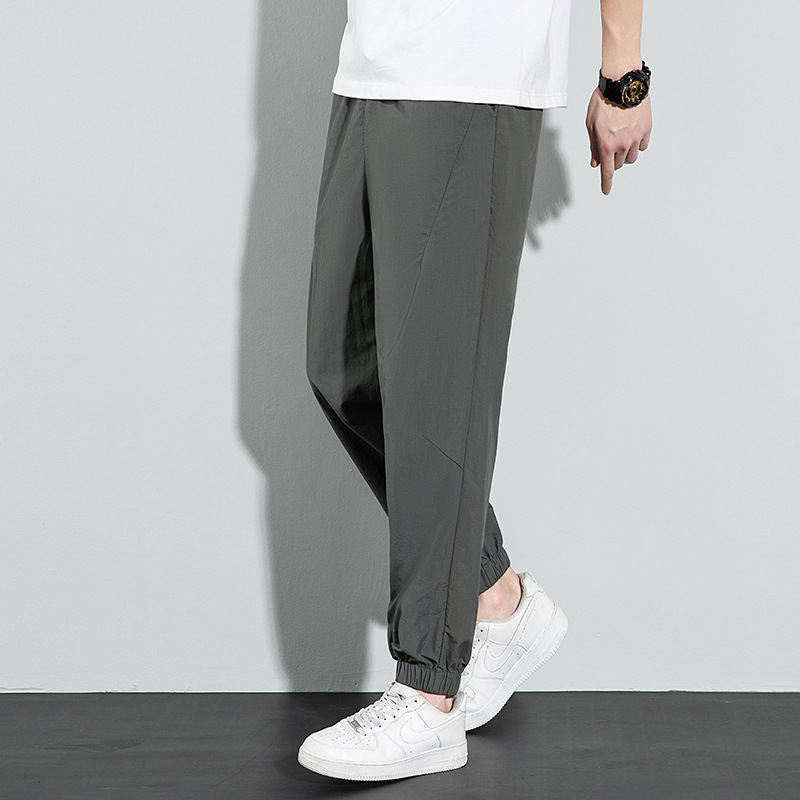 Pantalones de seda de hielo para hombres 2024 verano delgado suelto transpirable pantalones deportivos de secado rápido pantalones elásticos de pies de hielo casuales