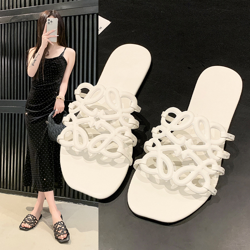 2025 nuevas zapatillas de playa casuales transfronterizas Nigeria Sudeste de Asia 3D calado fondo plano de una sola palabra zapatillas de mujer