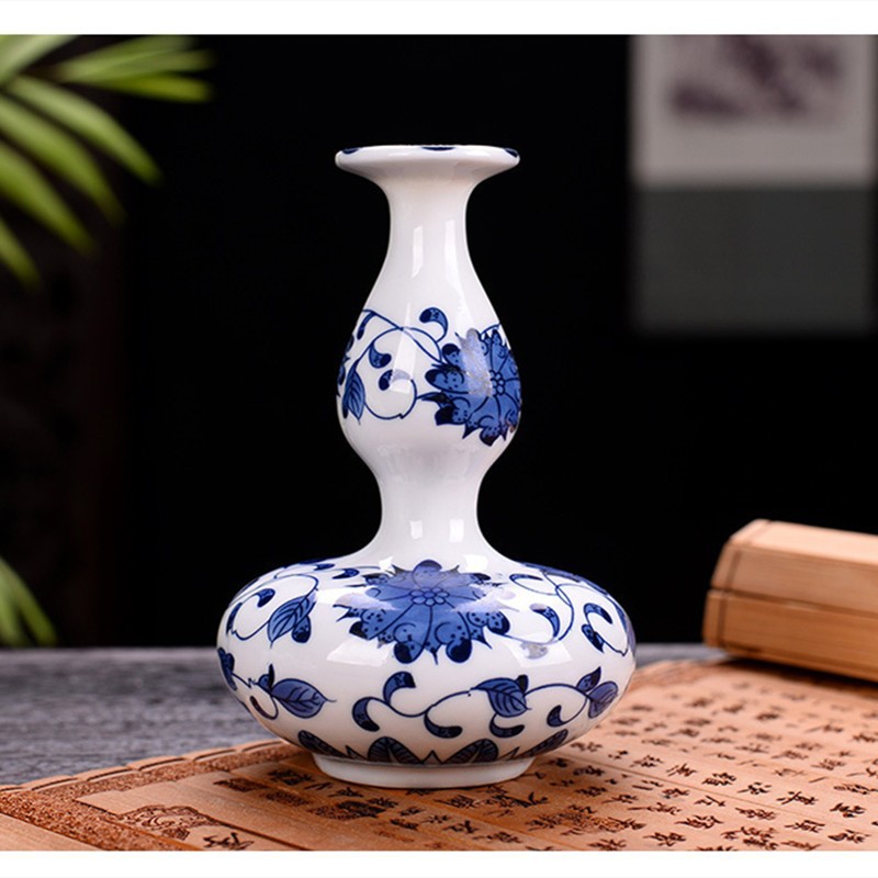Flores de porcelana azul, vasos de flores de cerámica de lujo ligero, flores de alto nivel, decoración de mesa de comedor de estilo nuevo chino