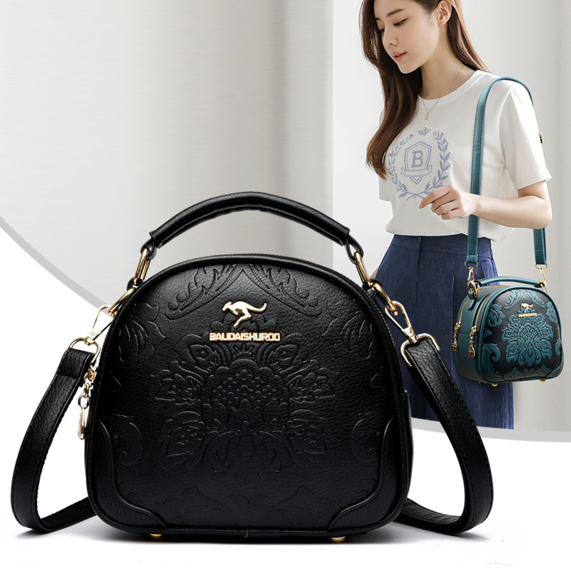 Bolso transfronterizo bolso de mujer 2023 Verano y otoño nuevo pequeño bolso redondo en relieve casual hombro crossbody bolso portátil mamá