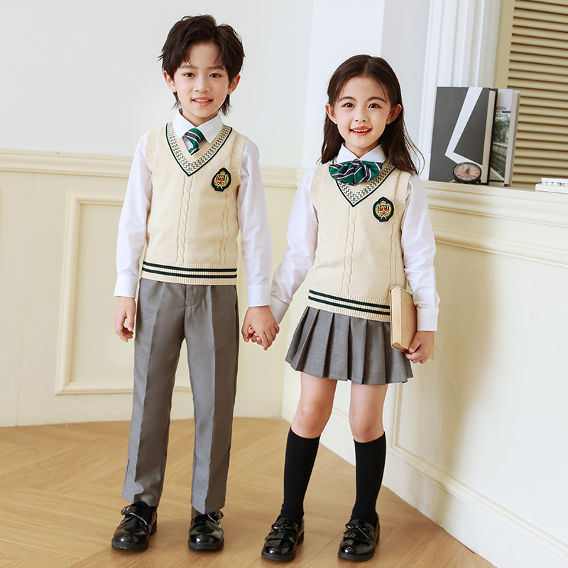 Uniforme escolar para estudiantes de primaria traje de primavera y otoño ropa deportiva de clase para niños primavera y verano jardín de infantes de cuatro piezas Ropa de jardín otoño algodón puro