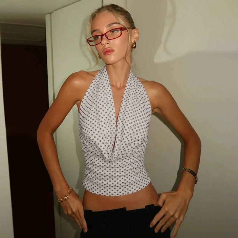 Европейская и американская женская одежда 2025, летняя новая сексуальная горячая девушка, универсальный без рукавов, обтягивающий жилет с лямкой на шее и открытой спиной в горошек, оптовая продажа