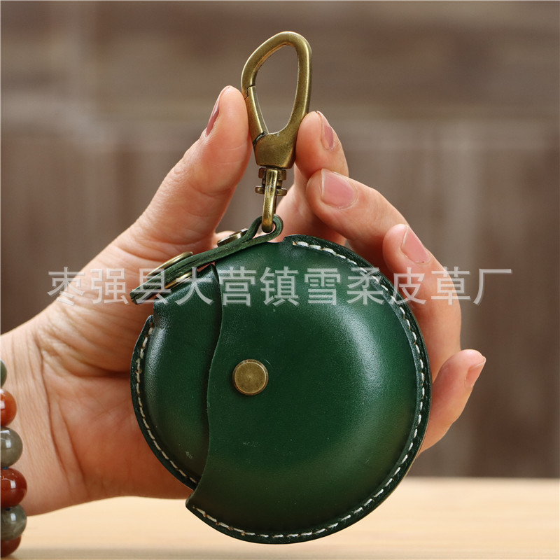 クリエイティブな一層牛革製ハンドメイド小銭入れ、イヤホンケーブル収納バッグ、丸型バッグ、ペンダント、小物入れ、レトロ収納バッグ