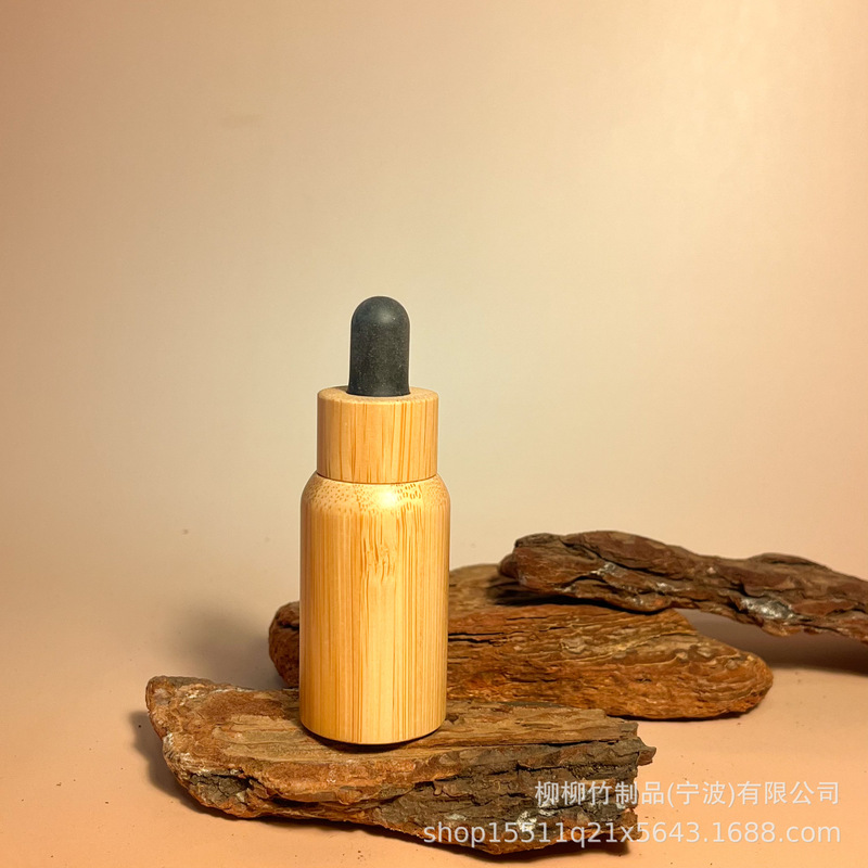 竹のゴムの頭の点滴の瓶の精華の液体の携帯は瓶の竹の製の光を避ける精華を分けて瓶の竹の木を分けて瓶を詰めます|undefined