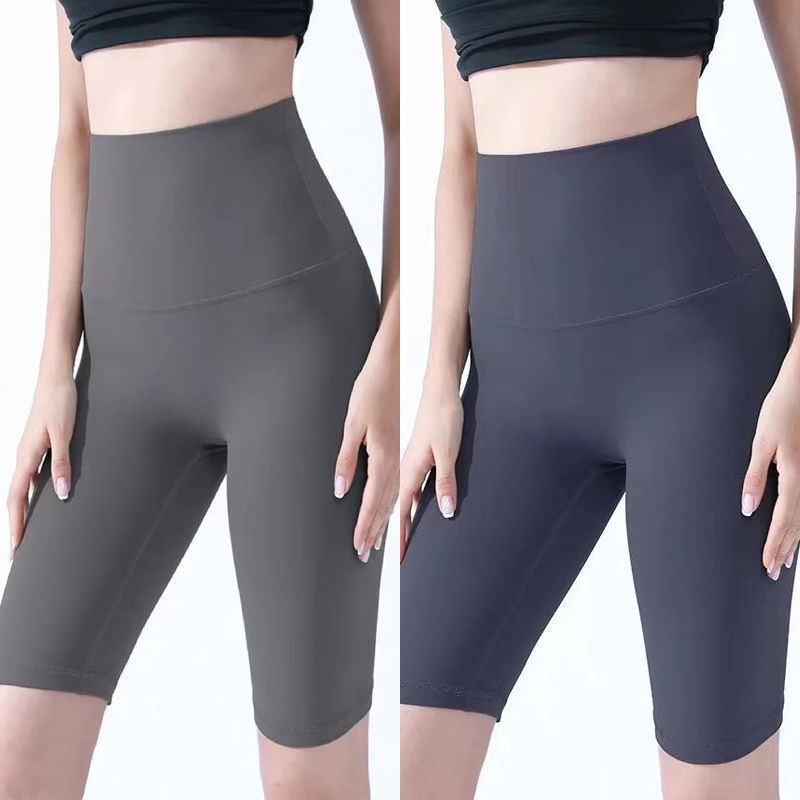 Pantalones cortos desnudos de mujer elásticos apretados para elevar las caderas de cinco puntos pantalones deportivos de secado rápido succión de sudor entrenamiento para correr fábrica de comercio de ping