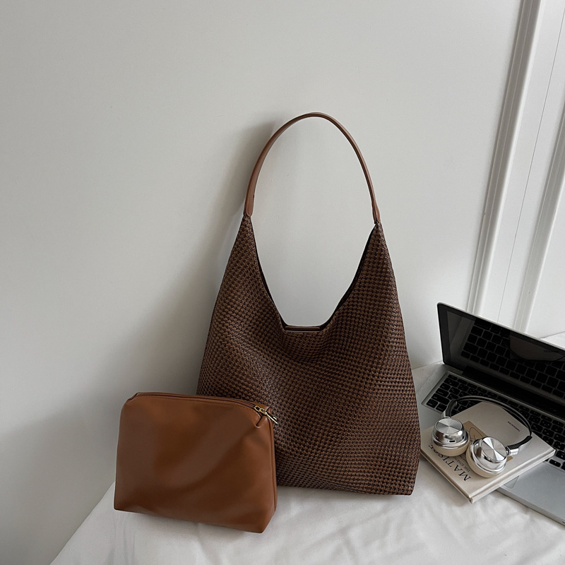 Bolso de comercio exterior de nicho de mujer retro tejido estriado bolso de mujer 2025 nuevo bolso de mano ocio de hombro bolso