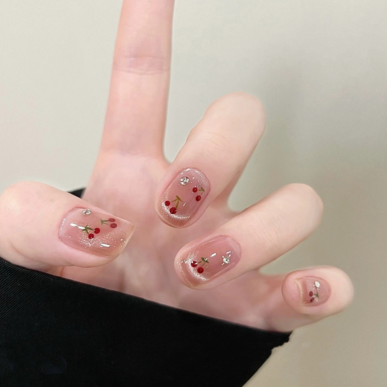 Nuevos productos de primavera y verano, ojos de gato, uñas de vestir de cereza francesa, blanco, corto, lindo parche de uñas de cereza tridimensional, uñas