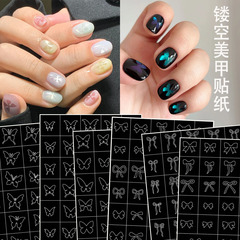 新商品の透かし彫りの蝶結びの爪は紙の蝶のスプレーの模版を貼って写真をたたいてぼかします。