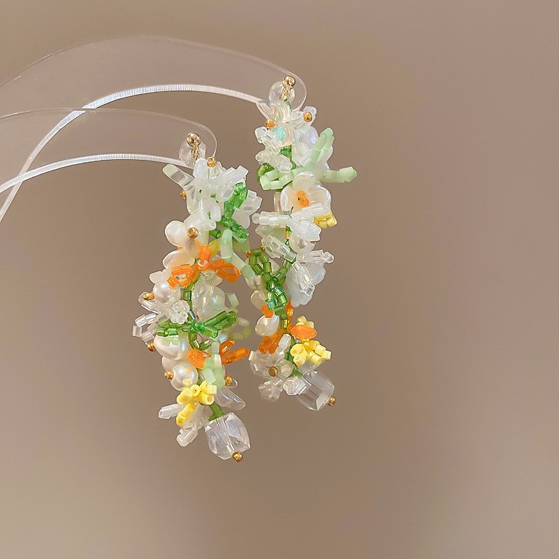 Pendientes de borla de flores de tela de aguja de plata Pendientes de estilo de vacaciones junto al mar