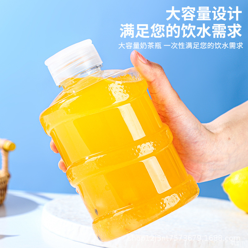 En stock cubo botella de plástico transparente PET jugo botella de bebidas grado alimenticio creativo desechable leche botella de té al por mayor