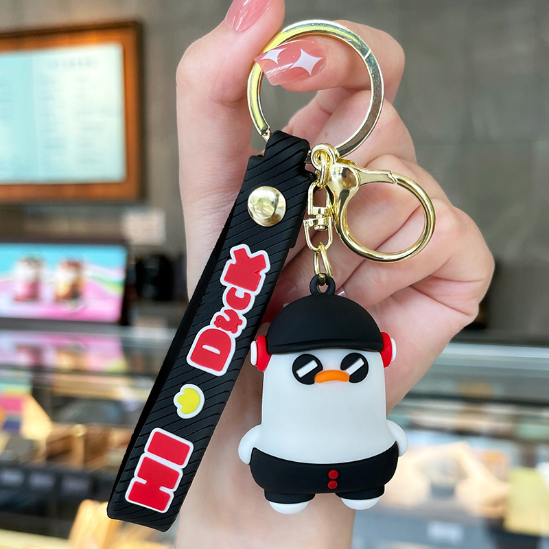 Venta directa de fábrica llavero colgante pequeño muñeca tridimensional llavero de coche mochila escolar colgante puesto al por mayor productos pequeños