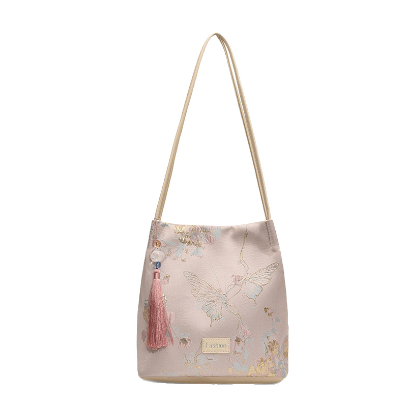 Personalización de fábrica nuevos bolsos de estilo chino para mujer verano nueva moda estilo nacional bordado bolso de cubo casual bolso de hombro de todo fósforo