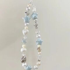 夏の海の塩の星の携帯電話は縄を掛けます。