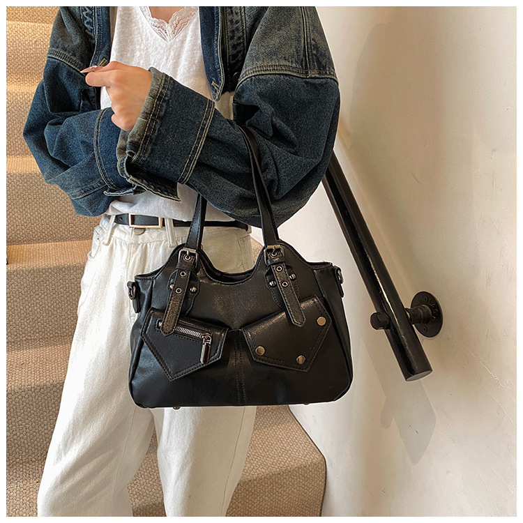 2024 transfronterizo retro Europa y América de gran capacidad bolso de hombro nuevo bolso de mochila empalmado bolso de mujer simple bolso de remaches bolso de mujer