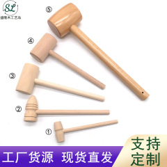 実木考古学の木のハンマーは周の小さい木のハンマーの木工の木のハンマーの頭のミニハンマーをつかんで星のケーキの木のハンマーを打ちます。