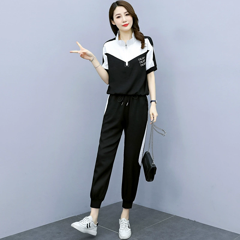 Оптовый повседневный спортивный костюм для женщин, лето 2025, новая коллекция, элегантный, стройнящий, модный, компактный комплект из двух предметов