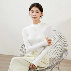 半高襟の底のシャツの女性の金の春秋の長袖の秋冬の洋風の女性の修身の薄い金の百合はやせている上着の婦人服を現します。