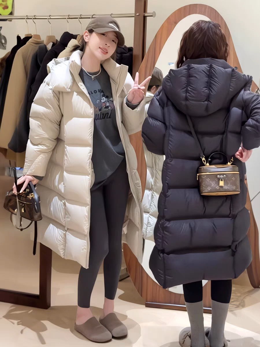 Nube puff suave 90 chaqueta de plumón blanco para mujeres largas rodillas largas gruesas sueltas 2025 nuevo