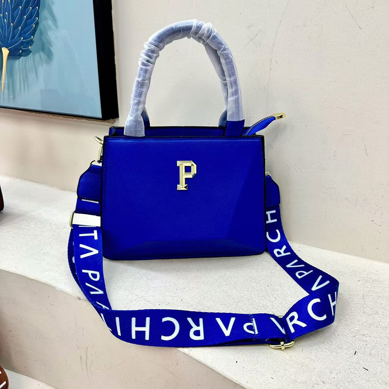 Bolsos transfronterizos para mujer 2025 primavera nuevo estilo bordado alfabeto Bolsos tote moda europea y americana bandolera de un solo hombro