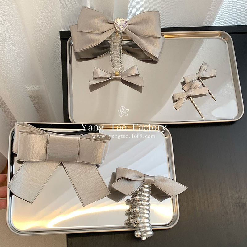 ¡Insfeng Silver es un artefacto mágico de tejido de cabello de la parte de la mano! Cabezas de cabello trenzadas de arco de cabello de cable telefónico