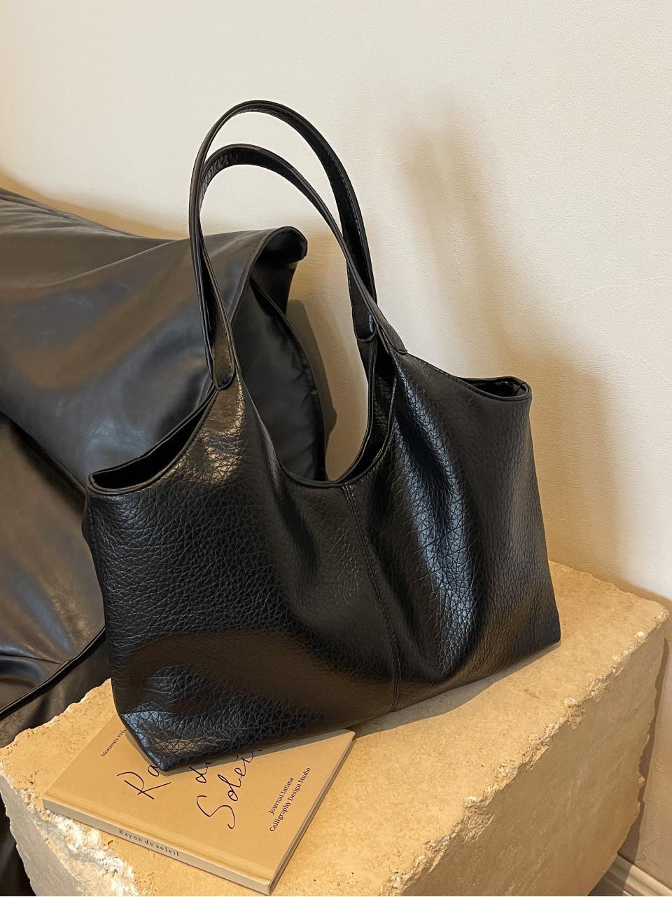 Bolsa de cuero suave transfronteriza para mujeres de gran capacidad 2025 nueva bolsa de hombro simple de textura casual