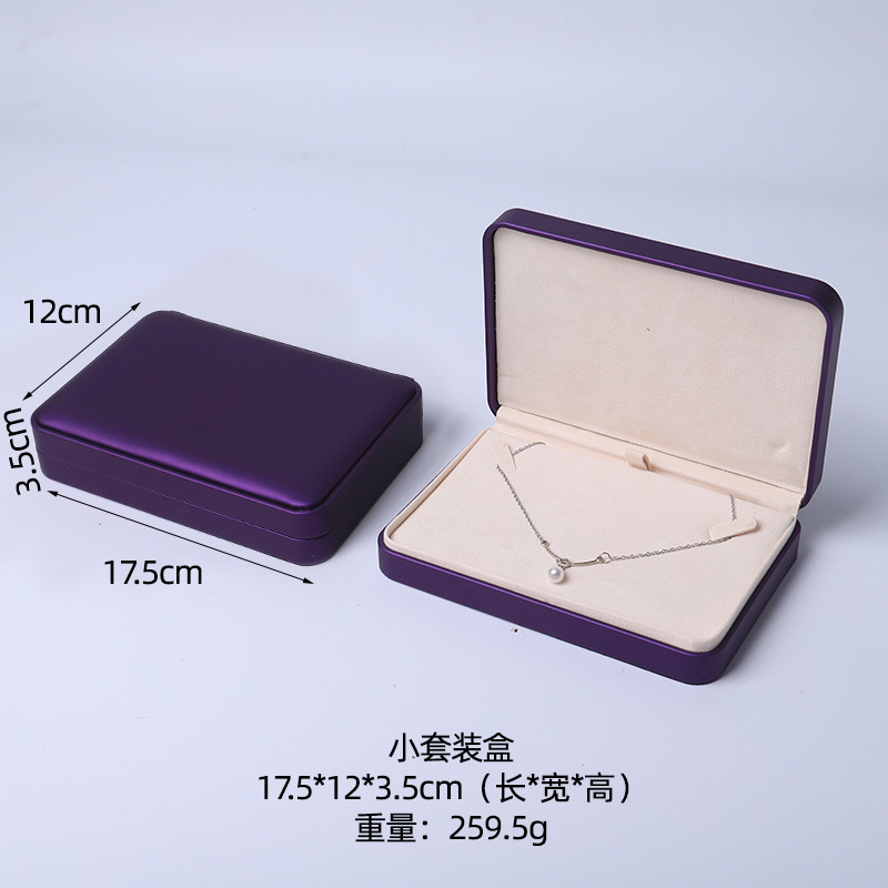 Caja de joyería rosa de alta calidad de cuero pu caja de embalaje de marca de joyería logotipo colgante pulsera collar caja de anillo