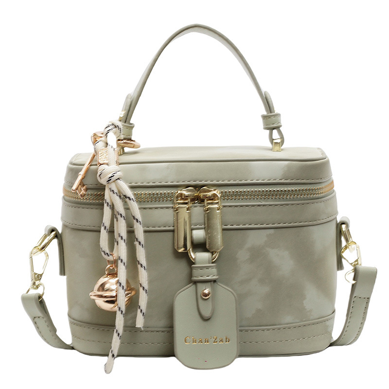 Este año, la popularidad de la bolsa de mano para mujeres 2025, nueva bolsa de hombro de tendencia universal, alta humedad, bolsa de cubo de moda