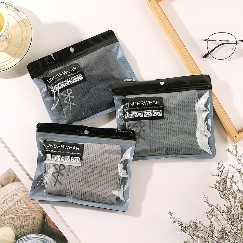 Embalaje independiente 5D Magic pantalones magnéticos ropa interior de cintura media para hombres ropa interior elástica de panal sin costuras transpirable que absorbe el sudor boxeadores