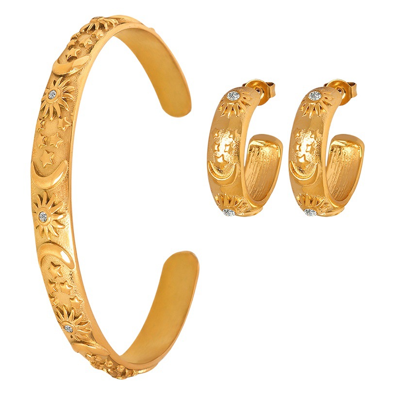 Nicho de lujo de luz de alivio de la estrella de la luna con incrustaciones de circón pendientes de la pulsera del todo-fósforo traje de las mujeres transfronterizas no se desvanece joyería