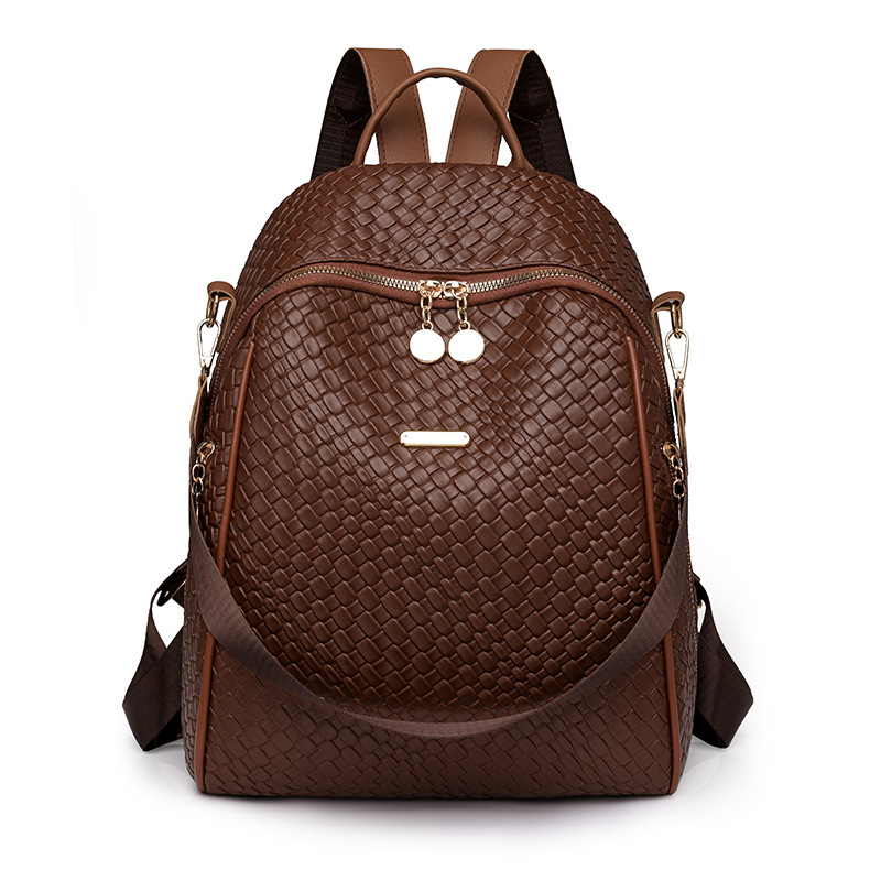 2024 exportación nueva mochila de cuero suave tejida para mujer moda y simple mochila de viaje al aire libre de doble uso marea