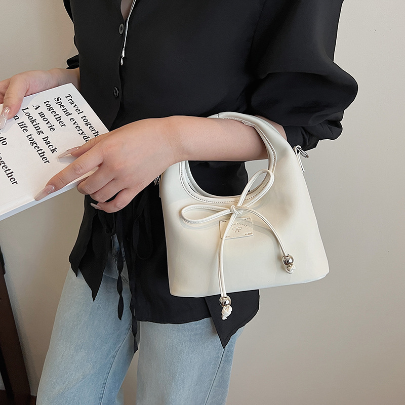 Bolso de moda coreano 2025 nuevo bolso de cadena bolso de hombro con textura esmerilada bolso de mensajero con lazo lindo