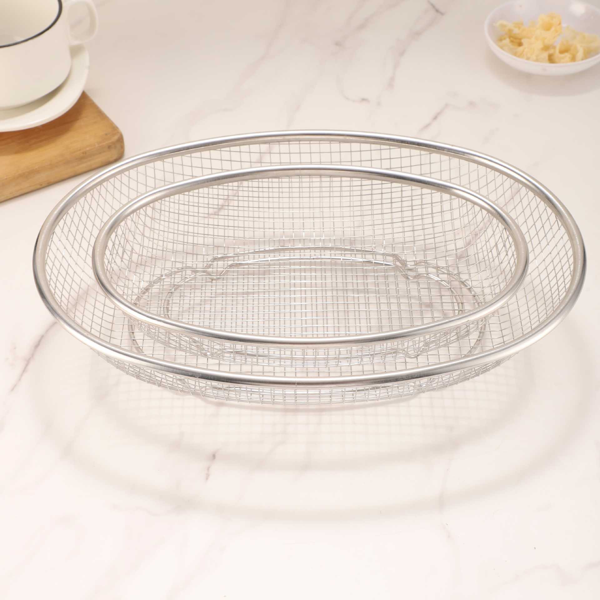 Stainless steel fruit and vegetable basket, oval draining basket, mesh frame, mesh sieve, kitchen chopstick and vegetable washing basket, storage basket wholesale