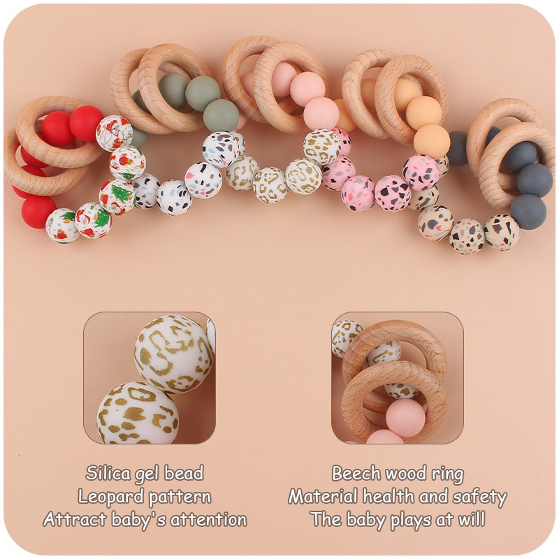 Nuevo bebé suministros de silicona leopardo cuentas mordedor pulsera calmante bebé DIY mordedura de silicona juguete de haya