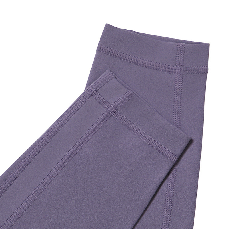 Nuevos pantalones de yoga sin costuras de cintura alta para mujer, estilo europeo y americano, pantalones deportivos de fitness con efecto levanta glúteos, pantalones que realzan la figura.